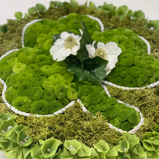 Learn how to make a Shamrock Funeral Tribute with Academy of Flowers